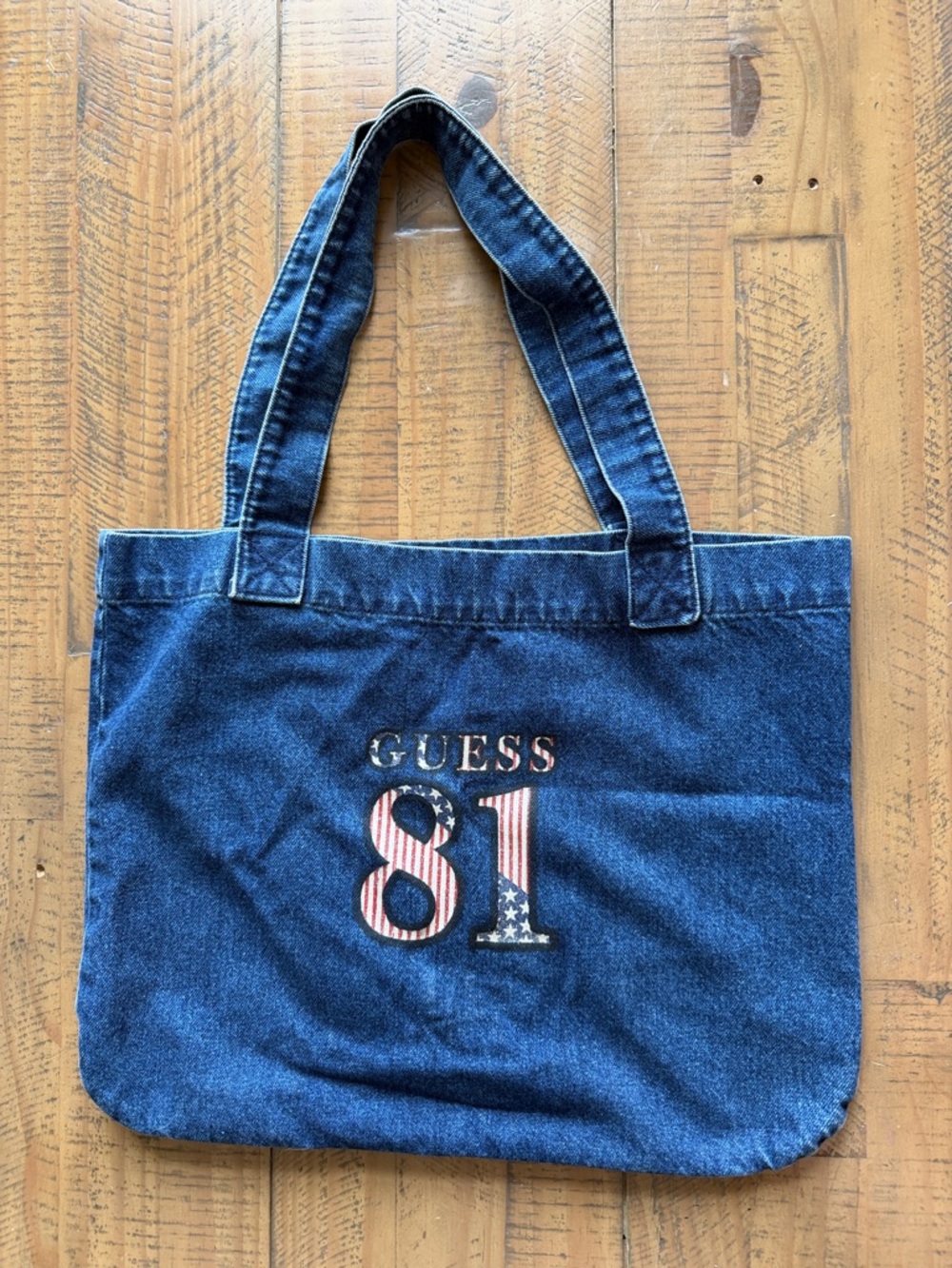 GUESS Denim Tote in Dark Blue with Red & White Flag Graphic